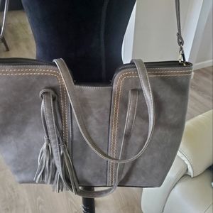Large vegan leather tote bag with tassel and decorative stitching